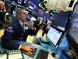 El NYSE Composite se ubica en 12 mil 633.41 unidades. AP / R. Drew