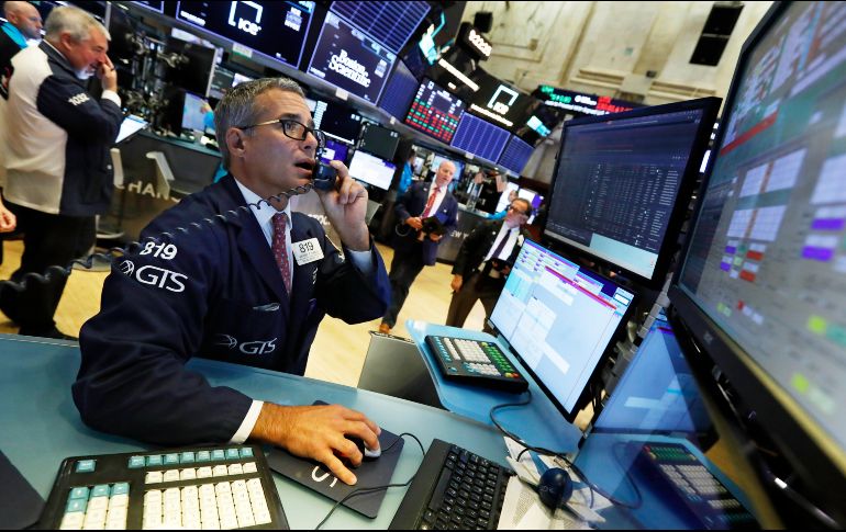 El NYSE Composite se ubica en 12 mil 633.41 unidades. AP / R. Drew