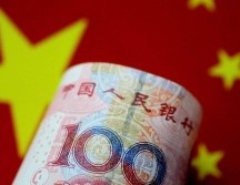 El Banco Popular de China ha dejado caer el yuan un 1.4% frente al dólar. GETTY IMAGES