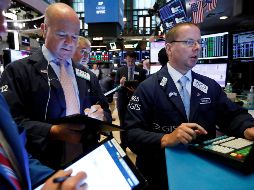 La calma regresó a los inversionistas después de que China estabilizó su moneda. AP/R. Drew