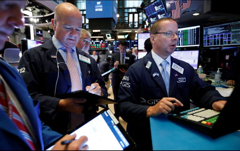 La calma regresó a los inversionistas después de que China estabilizó su moneda. AP/R. Drew