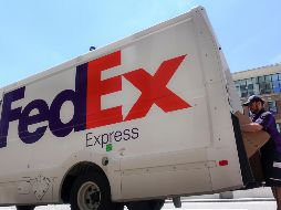 FedEx no entregará más paquetes en tierra para Amazon. AP/ J. Minchillo