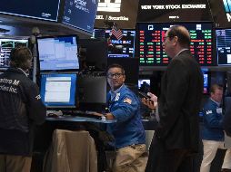El promedio industrial Dow Jones cerró con un retroceso de 90 unidades, o 0.3%, para situarse en 26 mil 287 puntos. AFP/D. Emmert