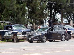 En Michoacán, se localizaron los cuerpos de nueve personas colgando de un puente, así como 10 cadáveres más, desmembrados y en bolsas de plástico. SUN
