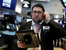 El NYSE Composite, por su parte, cede 79.71 puntos (-0.63 por ciento) al operar en 12 mil 668.71 unidades. AP / ARCHIVO