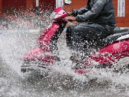 Para este sábado se esperan lluvias de aisladas a muy fuertes en la mayor parte del territorio mexicano, algunas acompañadas de descargas eléctricas, viento, caída de granizo y posibles deslaves en laderas de zonas montañosas. EFE / P. Adhikary