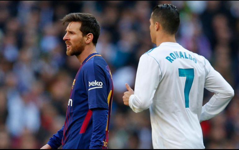 Cristiano Ronaldo y Lionel Messi son candidatos a ganar el premio a mejor jugador UEFA de la pasada temporada. AP/ARCHIVO
