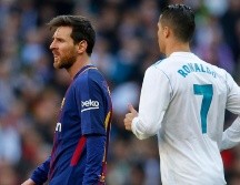 Cristiano Ronaldo y Lionel Messi son candidatos a ganar el premio a mejor jugador UEFA de la pasada temporada. AP/ARCHIVO