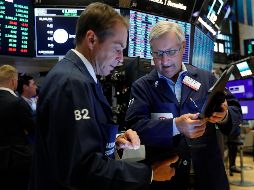 El promedio industrial Dow Jones subió 49 enteros, 0.2%, a 26 mil 252 puntos este jueves. AP/R. Drew