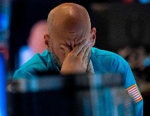 El promedio industrial Dow Jones se desplomó 623 puntos, o 2.4 por ciento. AFP/D. Emmert