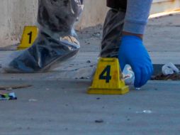 Personal de la fiscalía estatal recolectó indicios donde el mando militar resultó herido. AFP/ARCHIVO