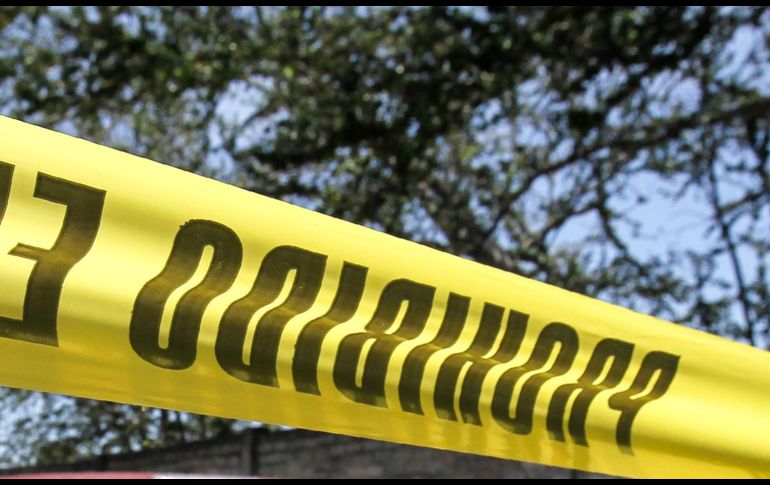 Peritos acudieron a procesar la escena del crimen. AFP/ARCHIVO