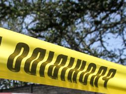 Peritos acudieron a procesar la escena del crimen. AFP/ARCHIVO