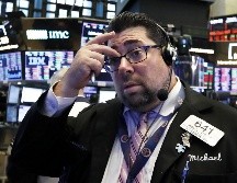 Las acciones financieras e industriales fueron las principales ganadoras este día. AP/ARCHIVO