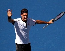 Roger Federer superó cómodamente a su rival Daniel Evans con un doble 6-2, 6-1. AFP/C. Brunskill