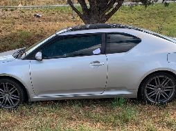 Imagen que muestra a uno de los vehículos afectados con impactos de bala. AFP/E. Villanueva