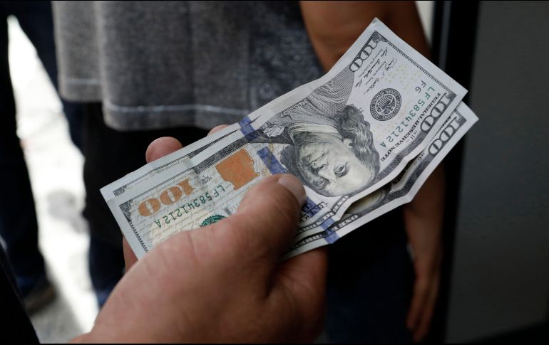 El FMI propone cerrar espacios grises en la ley y usar la tecnología para evitar fuga de dinero. AP/Archivo