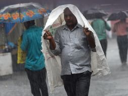 Durante la mañana y por la tarde habrá combinación de nubes y sol, mientras que para la noche habrá nubes dispersas y con probalidad de lluvia con actividad eléctrica. AFP / I. Mukherjee
