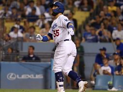 Russell Martin le dio la vuelta al juego con un bambinazo de tres carreras con dos outs, lo que impulsó la vuelta al marcador. AFP / V. Decolongon