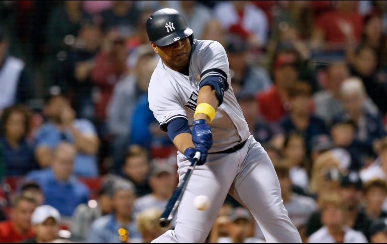 Encarnación empujó tres de las cinco carreras de los Yankees ayer ante Boston. AP/M. Dwyer