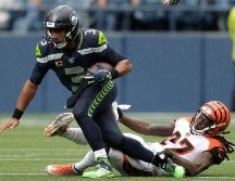 Wilson completó 14 de 20 envíos para 196 yardas y dos touchdowns. AP / S. Brashear