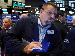 EL NYSE Composite opera en 12 mil 960.38 puntos. AP / R. Drew