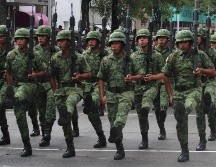 El evento transcurre sin novedad y cuenta con la presencia de 21 banderas con escolta, mil 200 efectivos de las Fuerzas Armadas, 144 integrantes de la Guardia Nacional, entre otros elementos de seguridad de Jalisco. EL INFORMADOR / E. Barrera