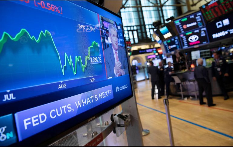 Apple y Microsoft finalizaron con pequeñas ganancias después de haber caído en las primeras horas de operaciones. AP/M. Lennihan