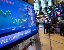 Apple y Microsoft finalizaron con pequeñas ganancias después de haber caído en las primeras horas de operaciones. AP/M. Lennihan
