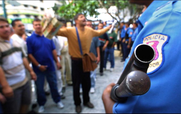 Human Rights Watch afirma que la Policía y las fuerzas de seguridad han dado muerte a casi 18 mil personas en Venezuela. AFP/Archivo