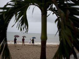 Personal de los municipios de Tecomán y Manzanillo, además del nivel estatal, ya trabaja para normalizar la situación. AP / ARCHIVO