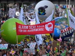 El anuncio coincidió con la manifestación de ciudadanos de todas partes del mundo para exigir más medidas contra el cambio climático. AFP / J. McDougall