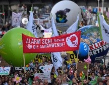 El anuncio coincidió con la manifestación de ciudadanos de todas partes del mundo para exigir más medidas contra el cambio climático. AFP / J. McDougall