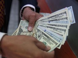 El dólar se adquirió en un mínimo de 18.73 pesos en bancos capitalinos. EL INFORMADOR/ARCHIVO