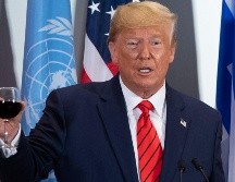 Acusan a Trump de intentar reclutar ilegalmente a un país extranjero para que le ayude en su reelección haciéndole daño a su rival. AFP/S. Loeb