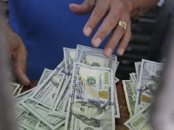 La moneda se compró en un precio mínimo de 18.55 pesos. EL INFORMADOR/ARCHIVO