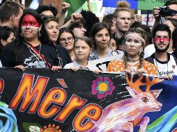 La marcha multitudinaria arrancó a primera hora de la tarde en el centro de la capital de Quebec, en medio de una atmósfera festiva. AFP/M. Panagiotakis