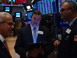 Las acciones de varios grupos chinos que cotizan en Nueva York cayeron este viernes. AFP/J. Eissele