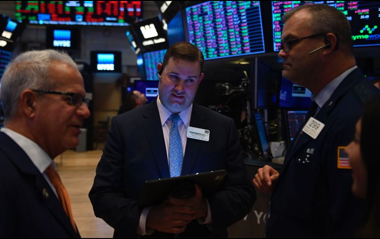 Las acciones de varios grupos chinos que cotizan en Nueva York cayeron este viernes. AFP/J. Eissele