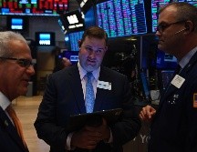 Las acciones de varios grupos chinos que cotizan en Nueva York cayeron este viernes. AFP/J. Eissele