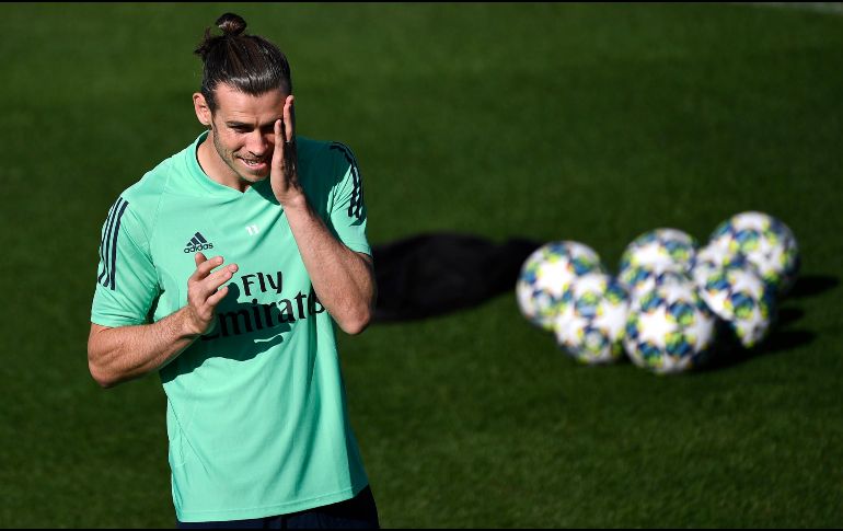 Bale junto a James no fue tomado en cuenta por Zidane para la segunda fecha de Champions League. AFP / P. Philippe Marcou