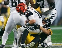 Andy Dalton fue asediado toda la noche por la defensiva de los Steelers, que lo capturó en ocho ocasiones y además logró un pase interceptado. AP / T. Puskar