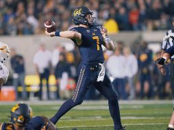 Los atletas universitarios de California podrán firmar contratos con marcas y vender su nombre e imagen a fin de tener ingresos económicos. AFP / T. W. Herderson