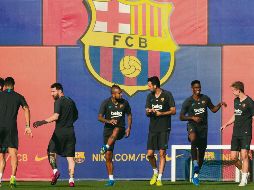 Jugadores del conjunto catalán realizaron ayer su última práctica antes del juego de hoy. EFE