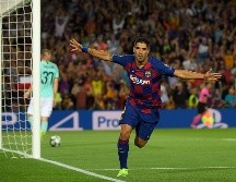 Suárez se convirtió en la figura del encuentro al anotar dos goles. AFP / L. Gene