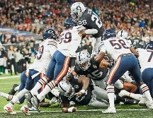 Josh Jacobs (#28) logró la anotación de la diferencia con menos de dos minutos por jugar. AP / T. Ireland