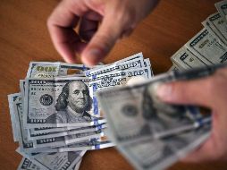 Se espera que el tipo de cambio cotice entre 19.50 y 19.65 pesos por dólar. AFP / ARCHIVO
