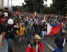 Las manifestaciones han dejado hasta el momento un muerto y centenas de heridos y detenidos. AP/F. Vergara