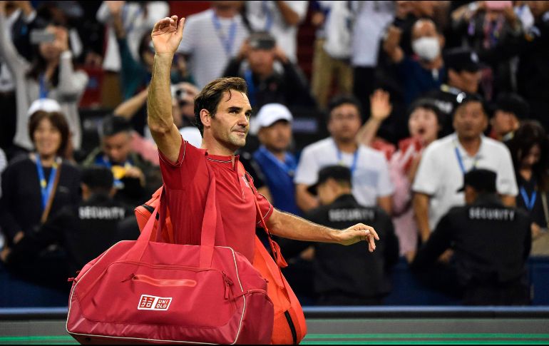 Cuando llegó a Shanghái, Federer tenía la misión de resarcirse de su actuación del año pasado, sin embargo se marcha sin alcanzar ese resultado. AFP / H. Retamal