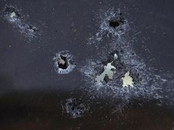 Los informes preliminares señalan que esta mañana de lunes sujetos fuertemente armados a bordo de varias camionetas emboscaron a elementos de la Policía Michoacán. AP / ARCHIVO